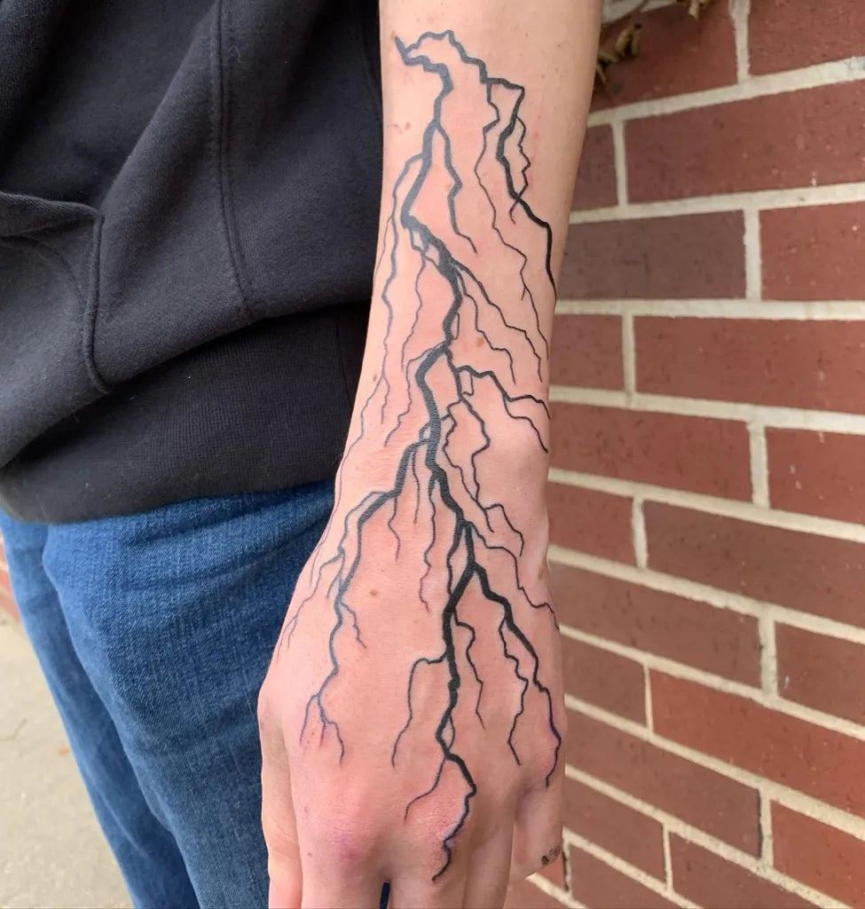 Medium Blackwork Lightning Tattoo on Men Arm by @catarino_tattoo