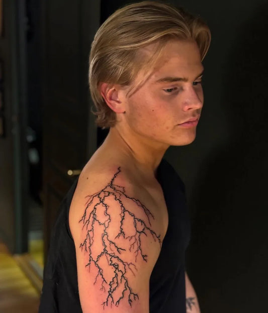 Medium Blackwork Lightning Tattoo on Men Shoulder by @dechillintattoo