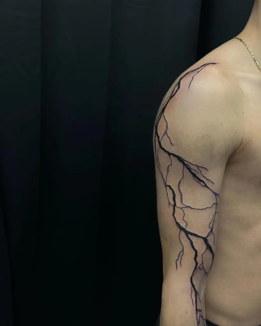 Medium Blackwork Lightning Tattoo on Men Shoulder by @tintenfuellerlea