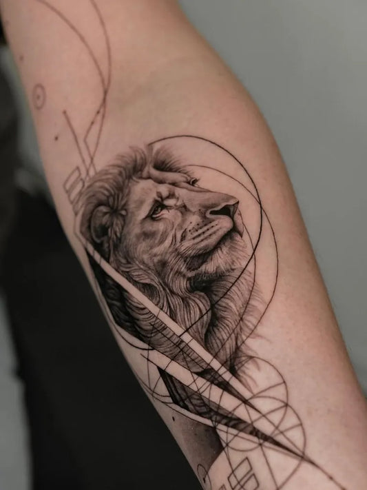 Medium Blackwork Lion with Geometric Lines on Men Arm Tattoo by @binofeyer