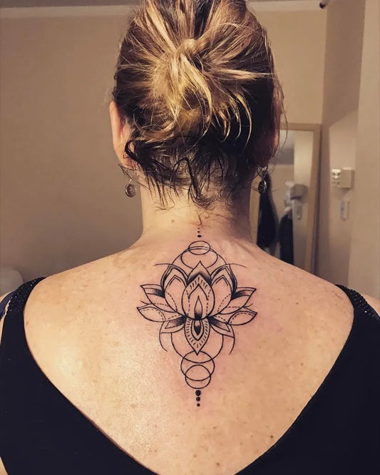 Medium Blackwork Lotus Flower Mandala on Women Back Tattoo by @dom.martins0