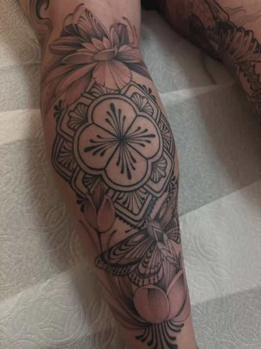 Medium Blackwork Lotus Flower Moth Mandala on Women Leg Tattoo by @blacklambx
