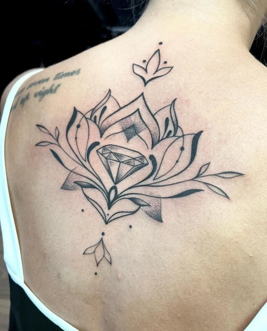 Medium Blackwork Lotus Flower with Diamond on Women Back Tattoo by @annkeevallik