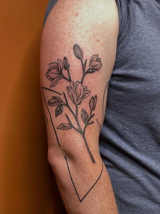 Medium Blackwork Magnolia Branch Nature Tattoo on Men Arm by @meghanmagdalene