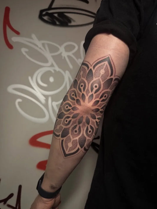 Medium Blackwork Mandala Tattoo on Men Arm by @abbieunderwoodtattoo