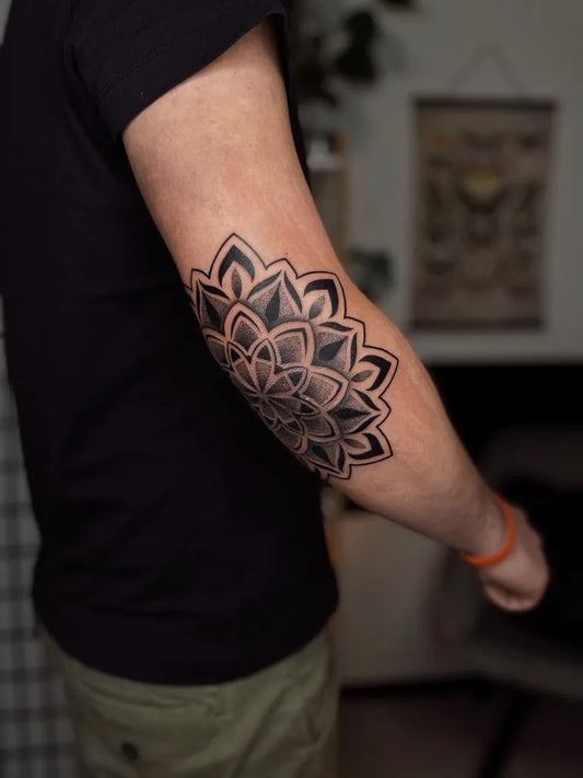 Medium Blackwork Mandala Tattoo on Men Arm by @lucija.krw