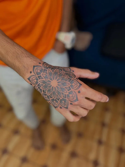 Medium Blackwork Mandala Tattoo on Men Hand by @pk_tattoo777