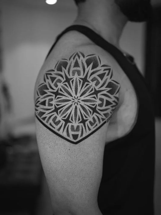 Medium Blackwork Mandala Tattoo on Men Shoulder by @tattoo_by_awelgalvez