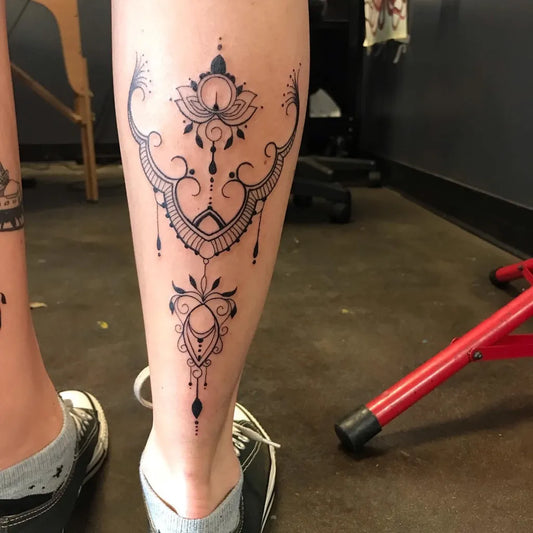 Medium Blackwork Mandala Tattoo on Women Calf by @sarahphilptattoo