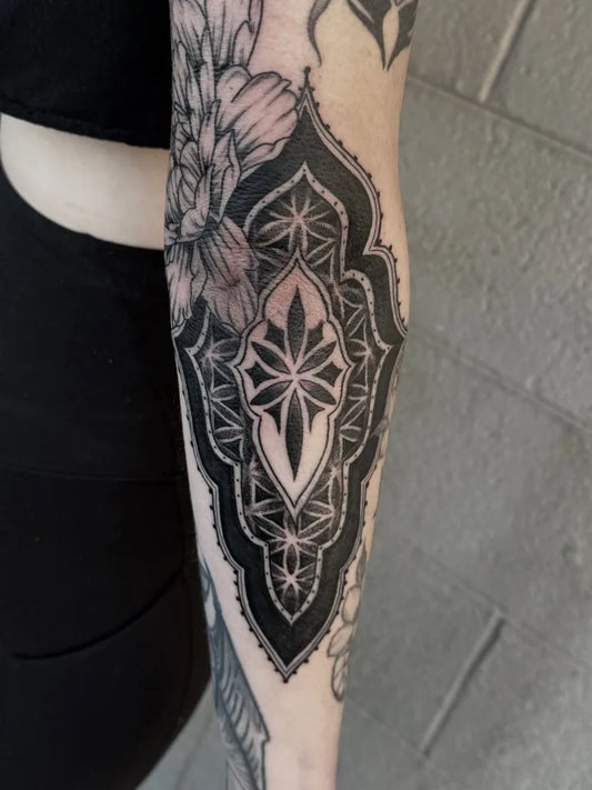 Medium Blackwork Mandala Tattoo on Women Elbow by @lindseytattooer