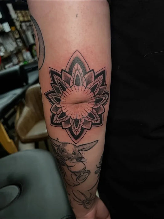 Medium Blackwork Mandala Tattoo on Women Elbow by @tatt.gabi