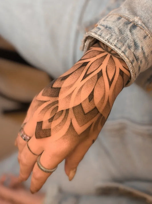 Medium Blackwork Mandala Tattoo on Women Hand by @alextreze13