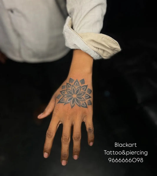 Medium Blackwork Mandala Tattoo on Women Hand by @black_art_tattoo_nandyal