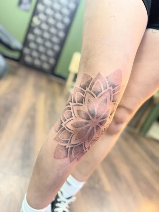 Medium Blackwork Mandala Tattoo on Women Knee by @emburdentattoo