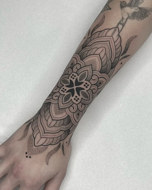 Medium Blackwork Mandala and Bird Tattoo on Women Forearm by @kimba.tattoo