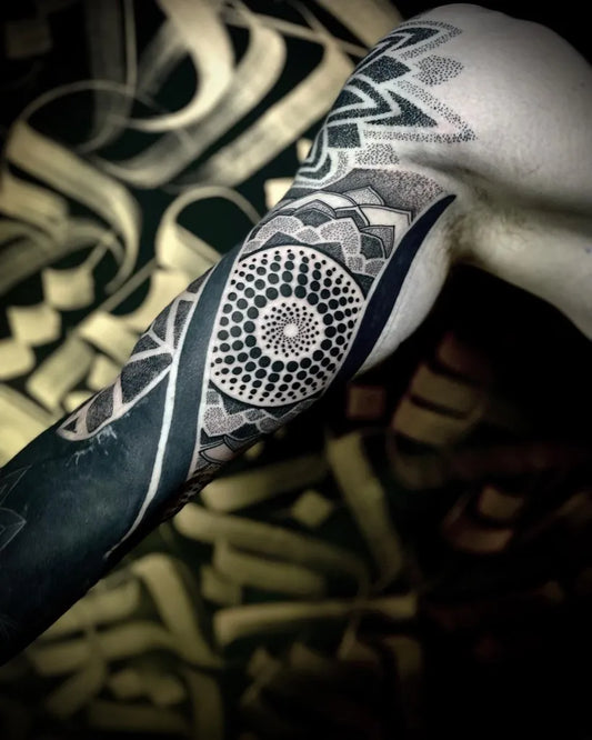 Medium Blackwork Mandala and Geometric Patterns Tattoo on Men Inner Arm by @matt.spiers.tattoo