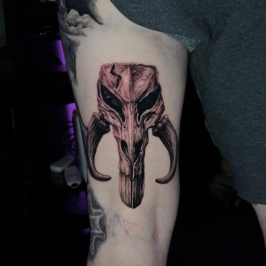 Medium Blackwork Mandalorian Skull Helmet Tattoo on Men Thigh by @cjr_art