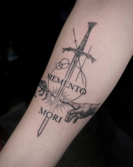 Medium Blackwork Memento Mori Sword with Hand on Men Arm Tattoo by @travel_and_tattoo