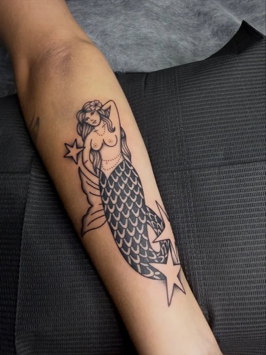 Medium Blackwork Mermaid Tattoo on Women Arm by @dridri_ink