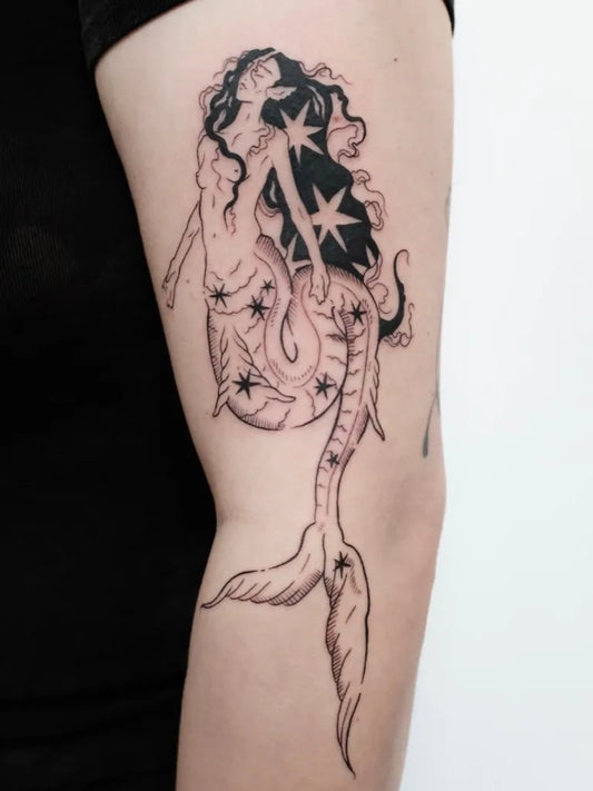 Medium Blackwork Mermaid Tattoo on Women Arm by @sophiewiegersma