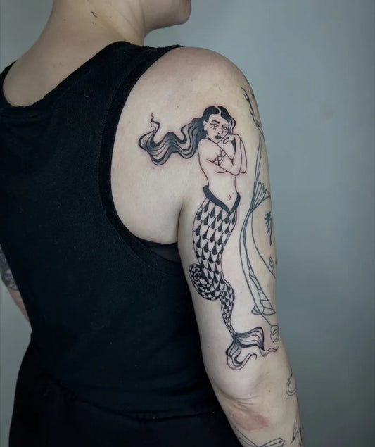 Medium Blackwork Mermaid Tattoo on Women Shoulder by @lre_ink
