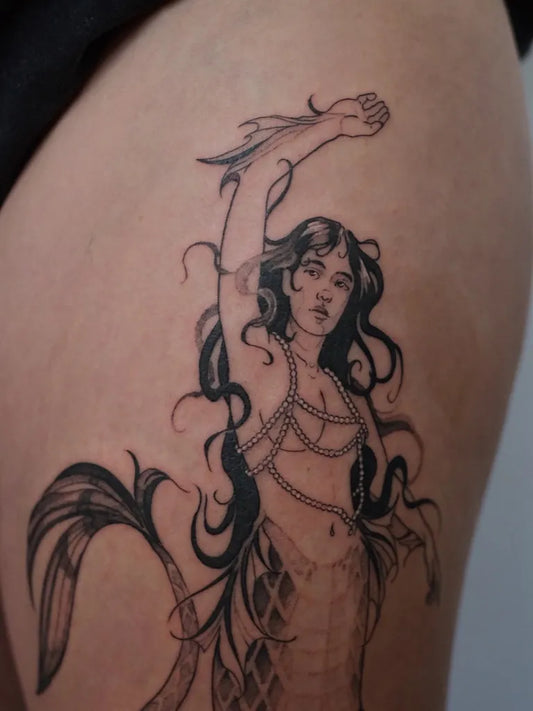 Medium Blackwork Mermaid Tattoo on Women Thigh by @finn.j.tattoos