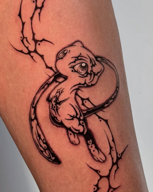 Medium Blackwork Mew with Thorns Tattoo on Women Thigh by @ayaropark