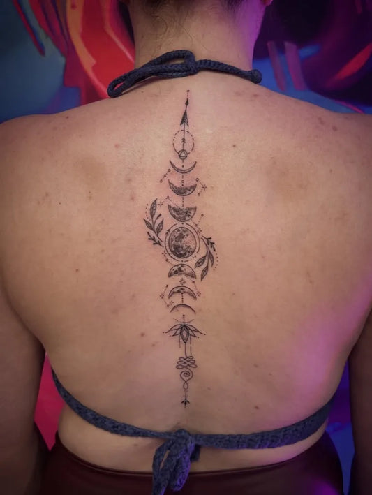 Medium Blackwork Moon Mandala Tattoo on Women Back by @emilia_paw_arts