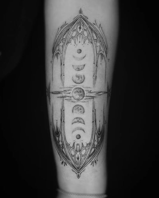 Medium Blackwork Moon Phases Tattoo on Women Arm by @threemoonstattoos