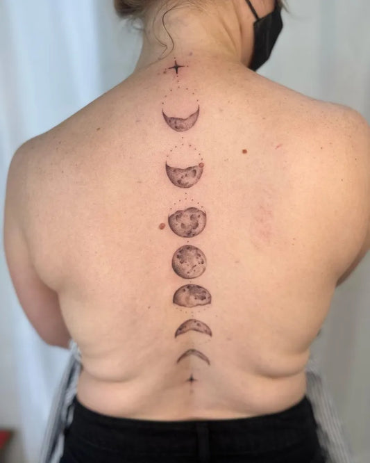 Medium Blackwork Moon Phases Tattoo on Women Back by @cherrybabycharms