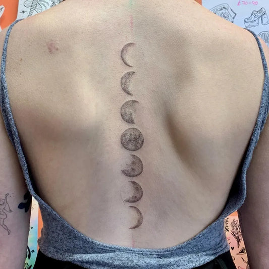 Medium Blackwork Moon Phases Tattoo on Women Back by @woftypokes