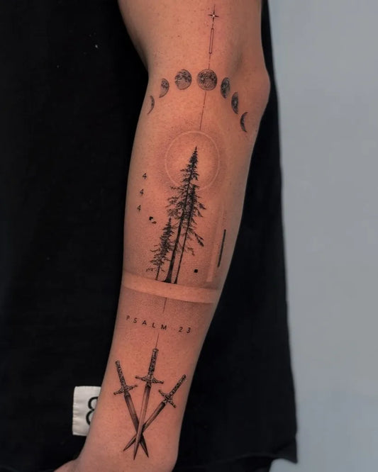 Medium Blackwork Moon Phases Tree and Swords Tattoo on Men Arm by @victoria.tattoos