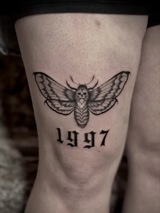 Medium Blackwork Moth and 1997 Women Knee Tattoo on by @ellaraintattoos