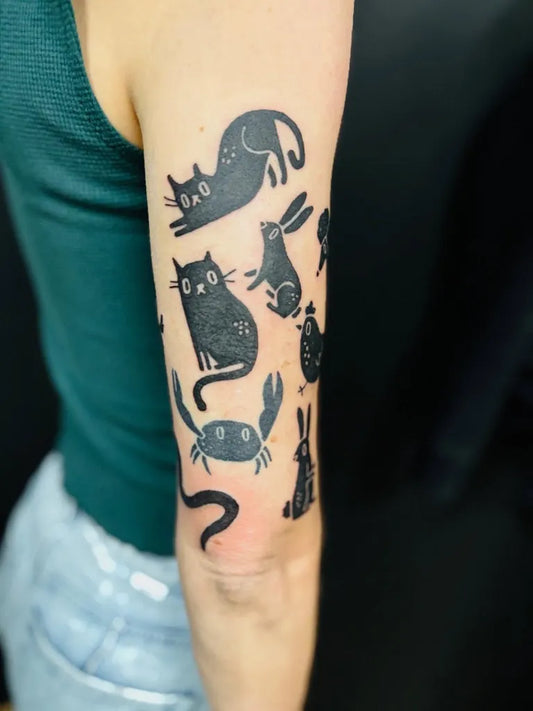 Medium Blackwork Multiple Animals Women Arm by @kindgoodsstudio