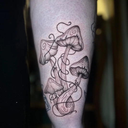 Medium Blackwork Mushrooms on Women Arm Tattoo by @aster.tattooo