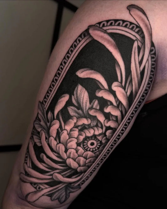 Medium Blackwork Negative Space Chrysanthemum in Black Tattoo on Women Arm by @stipplewhipper