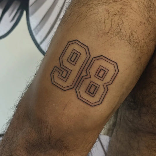 Medium Blackwork Numbers 98 Tattoo on Men Arm by @queridatinta_