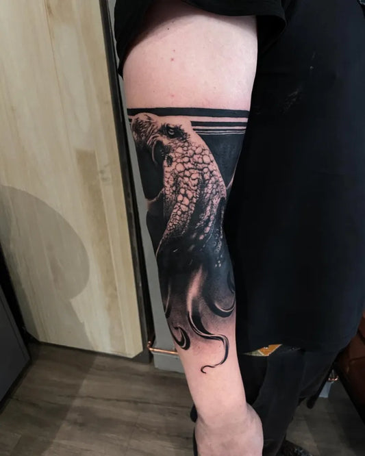 Medium Blackwork Octopus Nautical Tattoo on Men Arm by @mikestatuering