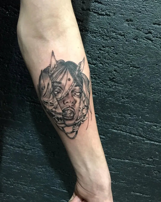 Medium Blackwork Oni Mask with Fox Ears on Men Arm Tattoo by @tuzlainktattoo