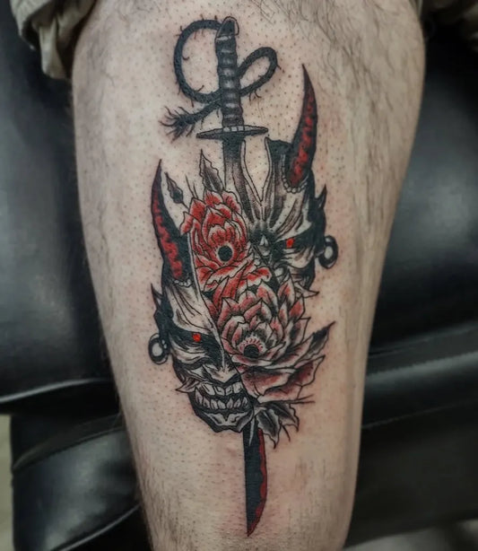 Medium Blackwork Oni Mask with Sword and Rose on Men Leg Tattoo by @tattoos.by.nate