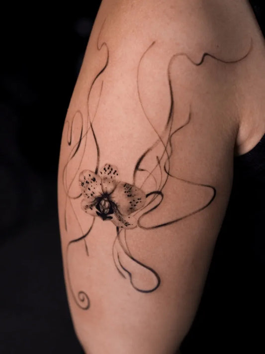 Medium Blackwork Orchid Flowers Tattoo on Women Arm by @fool.onastool