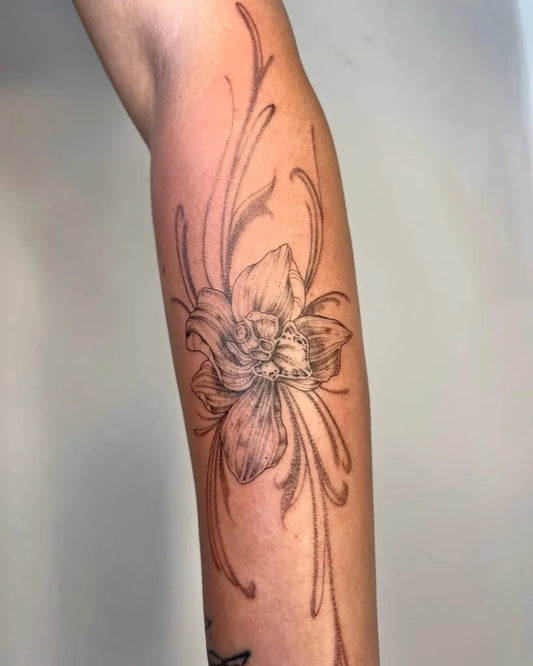 Medium Blackwork Orchid Tattoo on Women Arm by @eternalartistryink