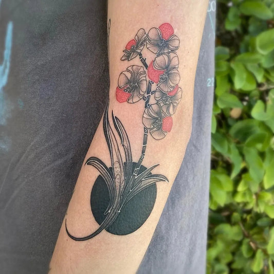 Medium Blackwork Orchid and Vase Tattoo on Women Arm by @darekriley