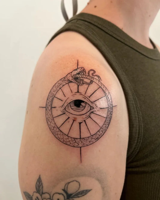 Medium Blackwork Ouroboros Eye Tattoo on Men Shoulder by @latinospaceboy
