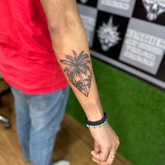 Medium Blackwork Palm Tree Tattoo on Men Forearm by @feather_art_studio_