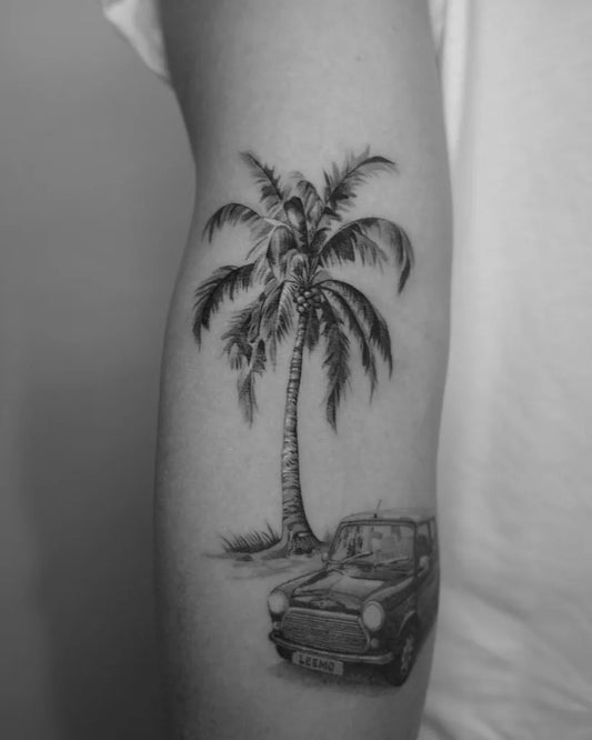 Medium Blackwork Palm Tree and Classic Car Tattoo on Men Arm by @chunntattoo