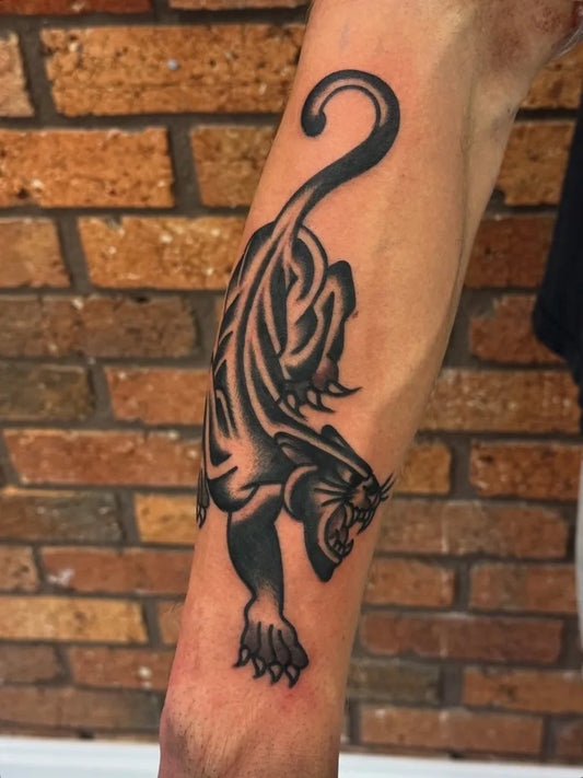 Medium Blackwork Panther Tattoo on Men Arm by @aaroncaldow