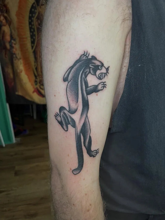 Medium Blackwork Panther Tattoo on Men Arm by @tattooer.jack