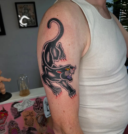 Medium Blackwork Panther Tattoo on Men Arm by @trentch.warfare