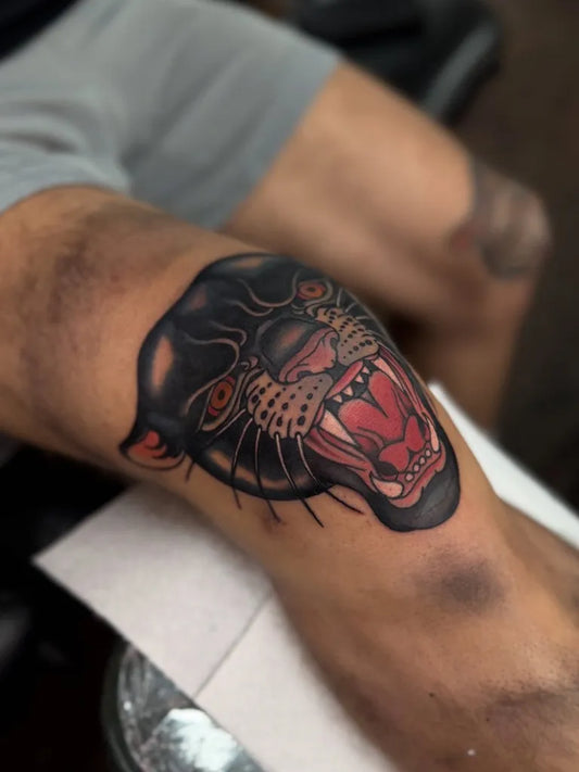 Medium Blackwork Panther Tattoo on Men Knee by @alex_bage